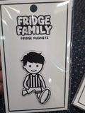 Packaging of Fridge Family fridge magnets with a cartoon character on a dark textured surface.